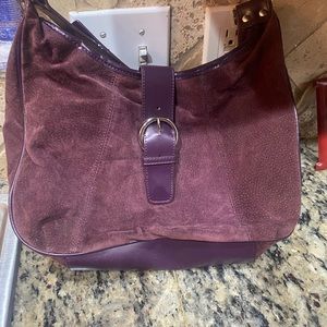 Wilson’s leather purse in purple